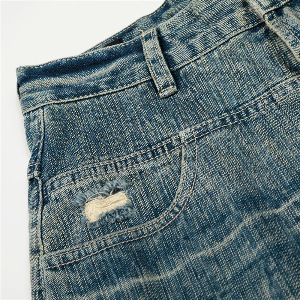 Distressed denim jeans