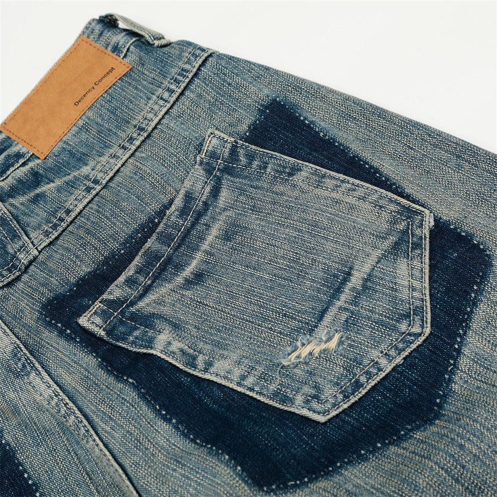 Distressed denim jeans