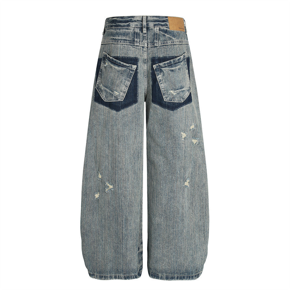 Distressed denim jeans